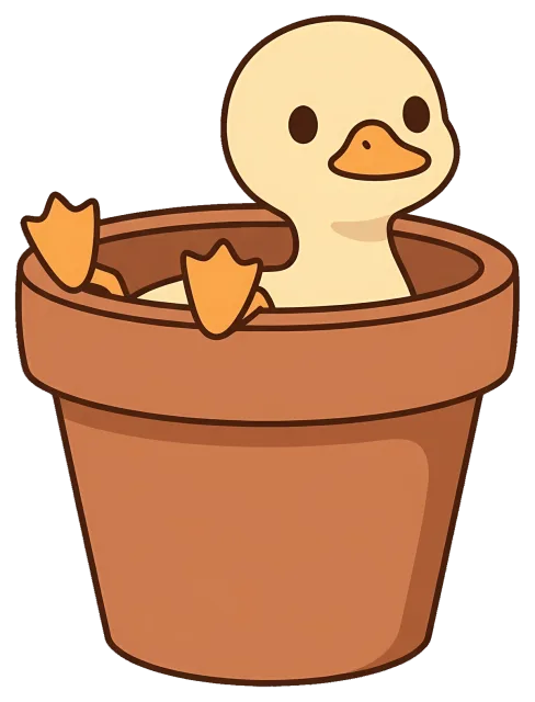 Cute duckling sitting inside a flower pot