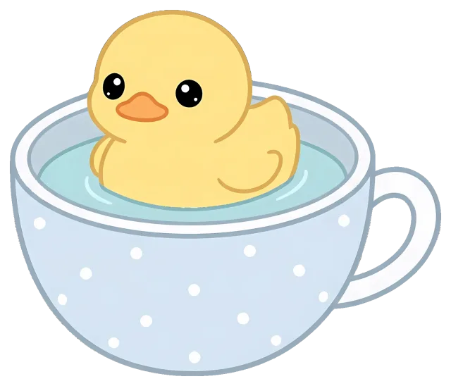 Cute yellow duckling sitting in a polka dot teacup